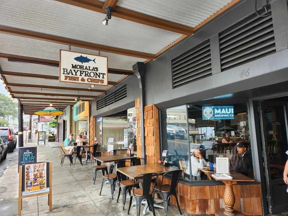 Mohala’s Bayfront Fish & Chips storefront with sidewalk seating in downtown Hilo.